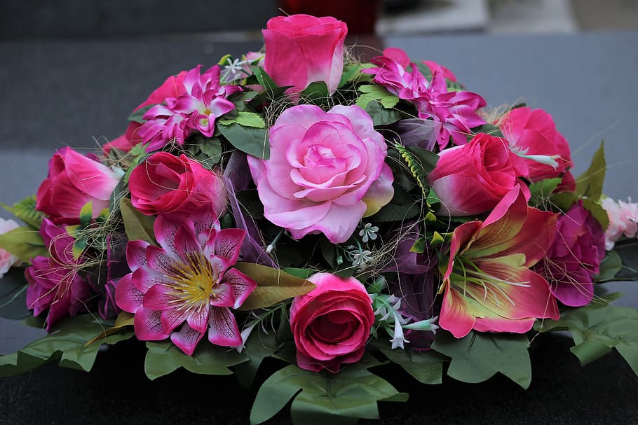 colorful artificial flowers, roses arrangement, decoration, condolence, black marble, gravestone, cemetery, outdoor, flower, flowering plant