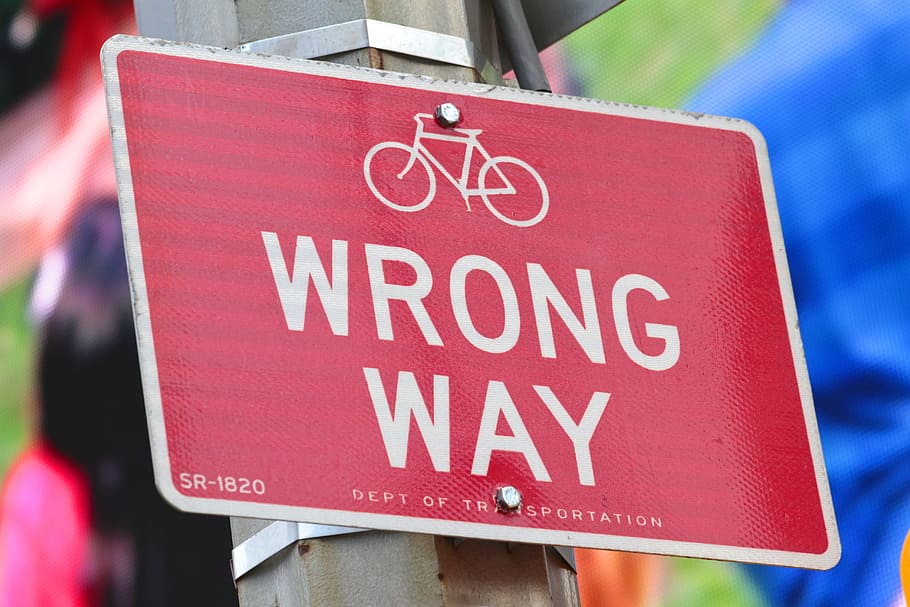 wrong way signage, wrong way, wrong, way, confused, sign, transit sign, red, bicycle, symbol