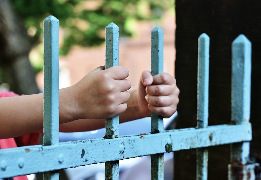 hands, fence, demarcation, bars, hold tight, keep, iron fence, gate entrance, blocked, locked