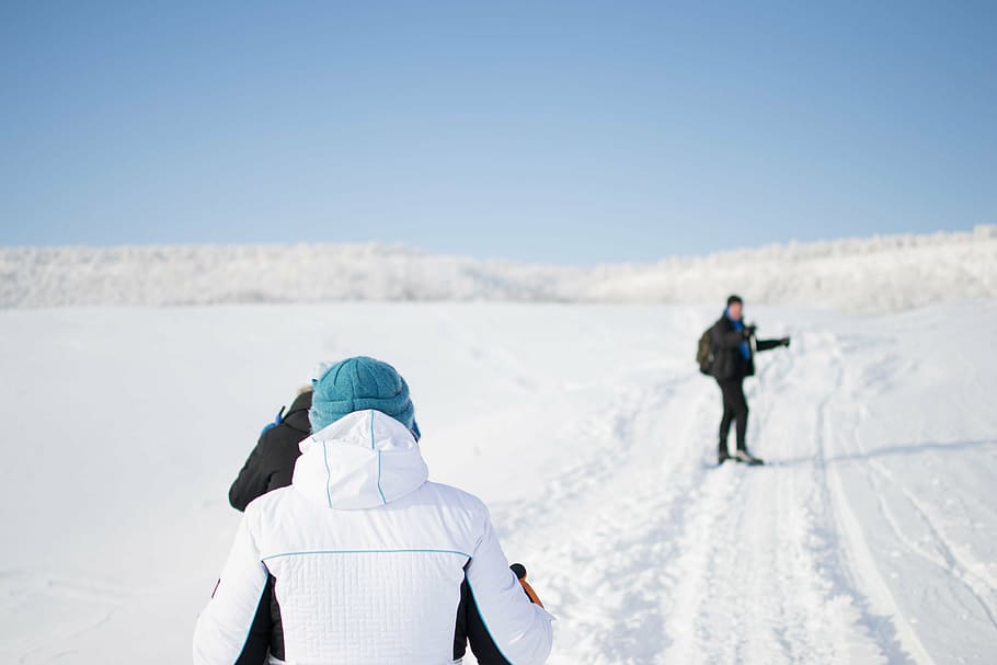 person, standing, snow field, daytime, people, men, outdoor, walking, hiking, snow