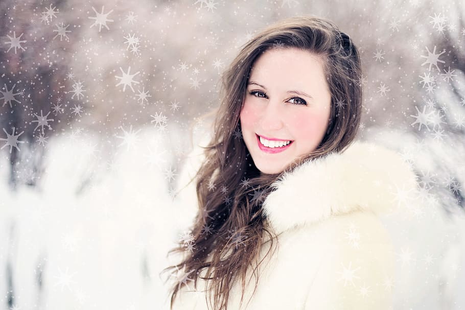 woman taking selfie, woman, snow, winter, portrait, snowflakes, smiling, cold, cold temperature, warm clothing
