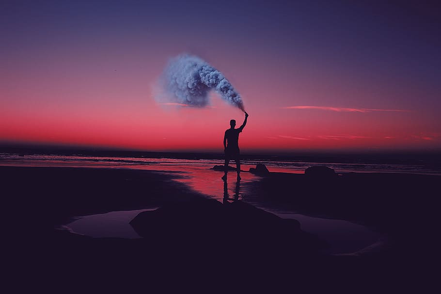 silhouette photo man, holding, emergency smoke, sea, ocean, water, waves, nature, sand, people