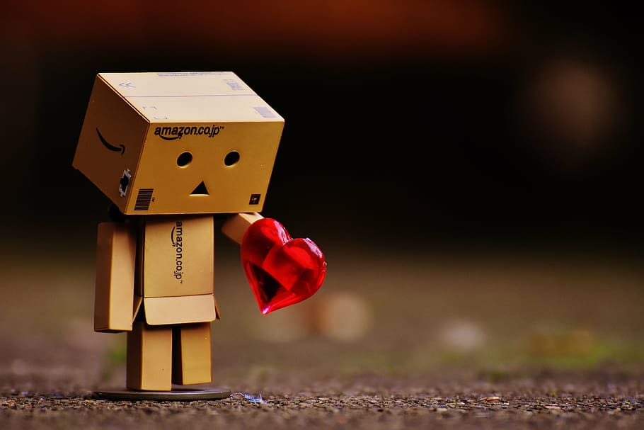 selective, focus photography, brown, cardboard box person, holding, heart, danbo, figures, love, longing