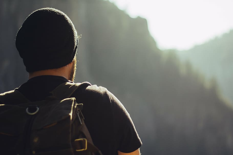 man, black, t-shirt, beanie, brown, backpack, hiking, trekking, mountains, backpacking