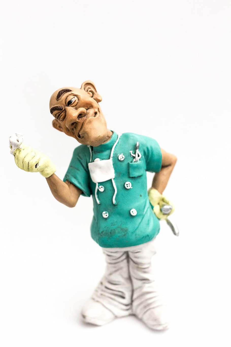 man, holding, handheld, tool figurine, Professional, Work, Dentist, doctor, hospital, studio shot