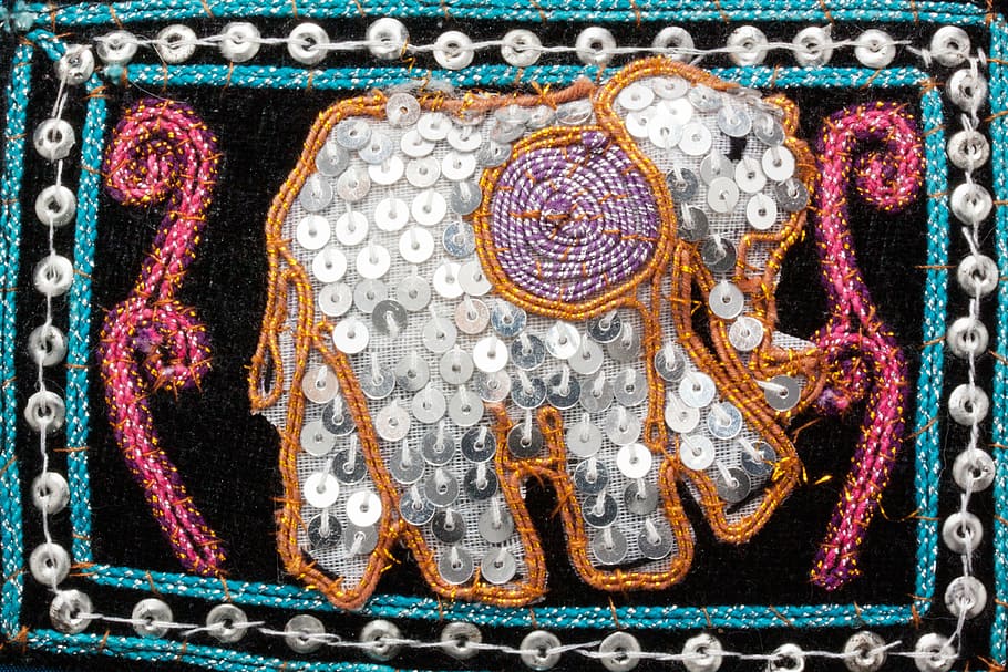 elephant, graphically, sequins, sparkle, shiny, hand labor, sewn, silver, turquoise, red