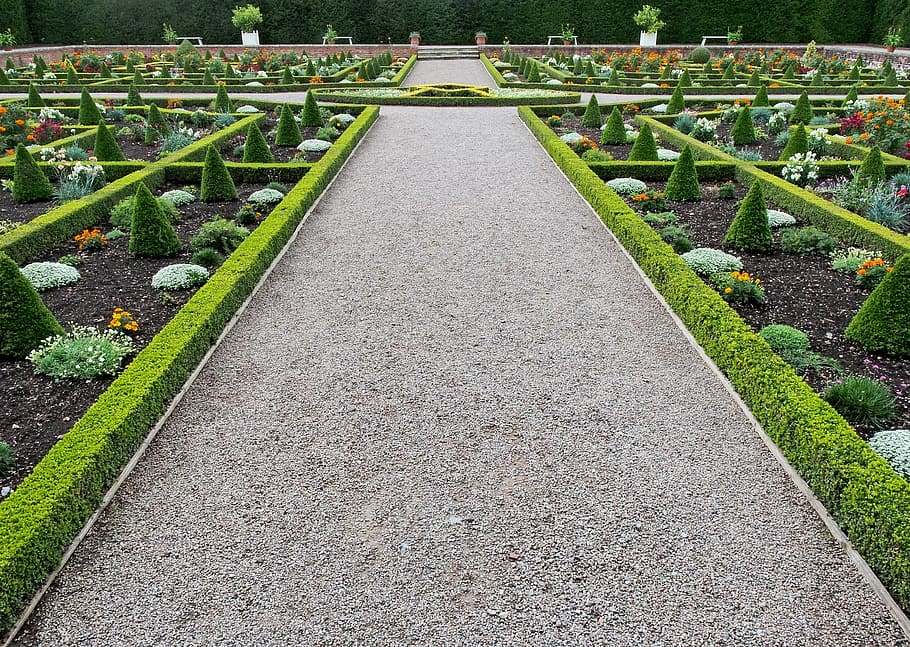 gray, gravel pathway, surrounded, green, leafed, plants, taken, daytime, garden, formal