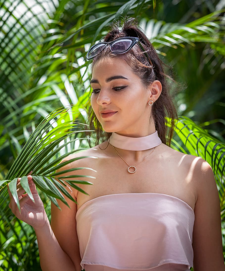 woman, holding, sago palm, leaves, daytime, girl, model, fashion model, townsville girl, queensland