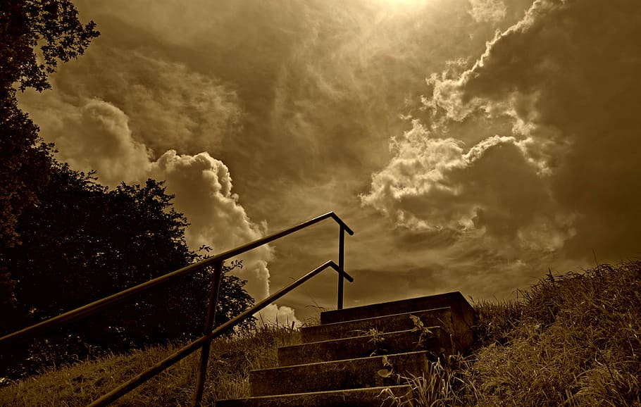 gray, concrete, stairs, metal handrail, sky, clouds, hill, staircase, stone steps, dramatic