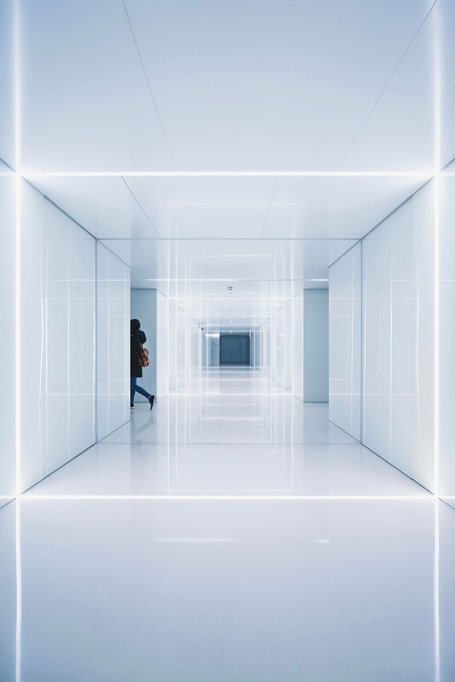 person, walking, inside, white, hallway, architecture, building, structure, establishment, symmetry