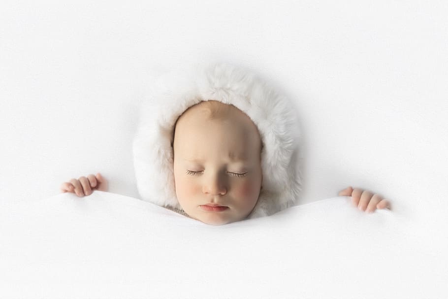 child, baby, minimalist, white background, cute, portrait, sleeping, blanket, one person, indoors
