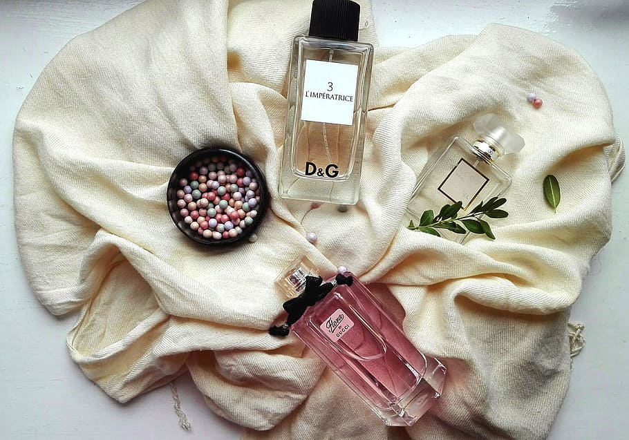 red, white, d&g, &g perfume bottles, Perfume, Cosmetics, Women, close-up, indoors, day