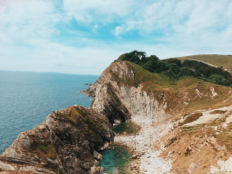 Costa jurásica, Dorset, Inglaterra, Reino Unido, naturaleza, paisaje, océano, mar, cala de lulworth, cielo