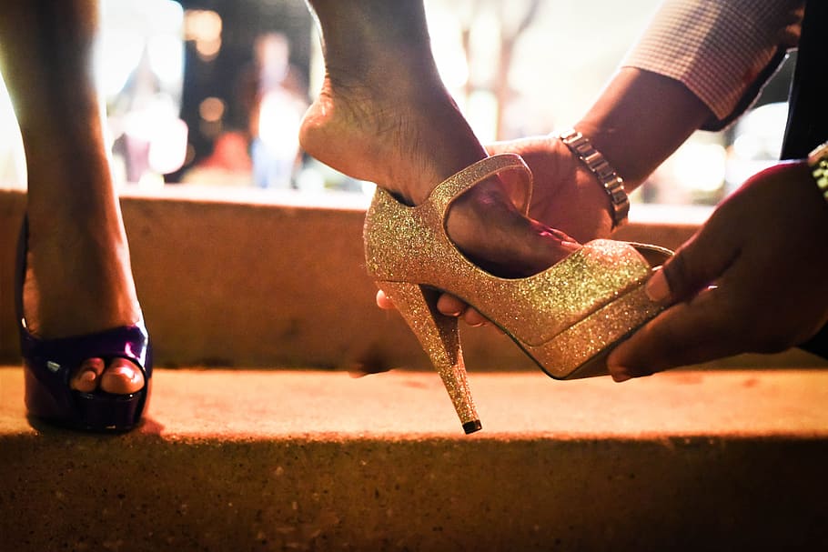 man, holding, gold-colored heeled sandal, people, adult, woman, cinderella, sparkle, shoe, shoes
