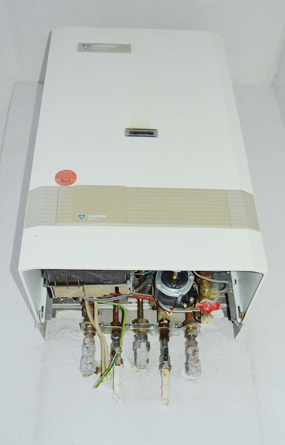 white metal machine, heating, gas water heater, floor heating, junkers, zwr 19, high angle view, white color, indoors, hospital