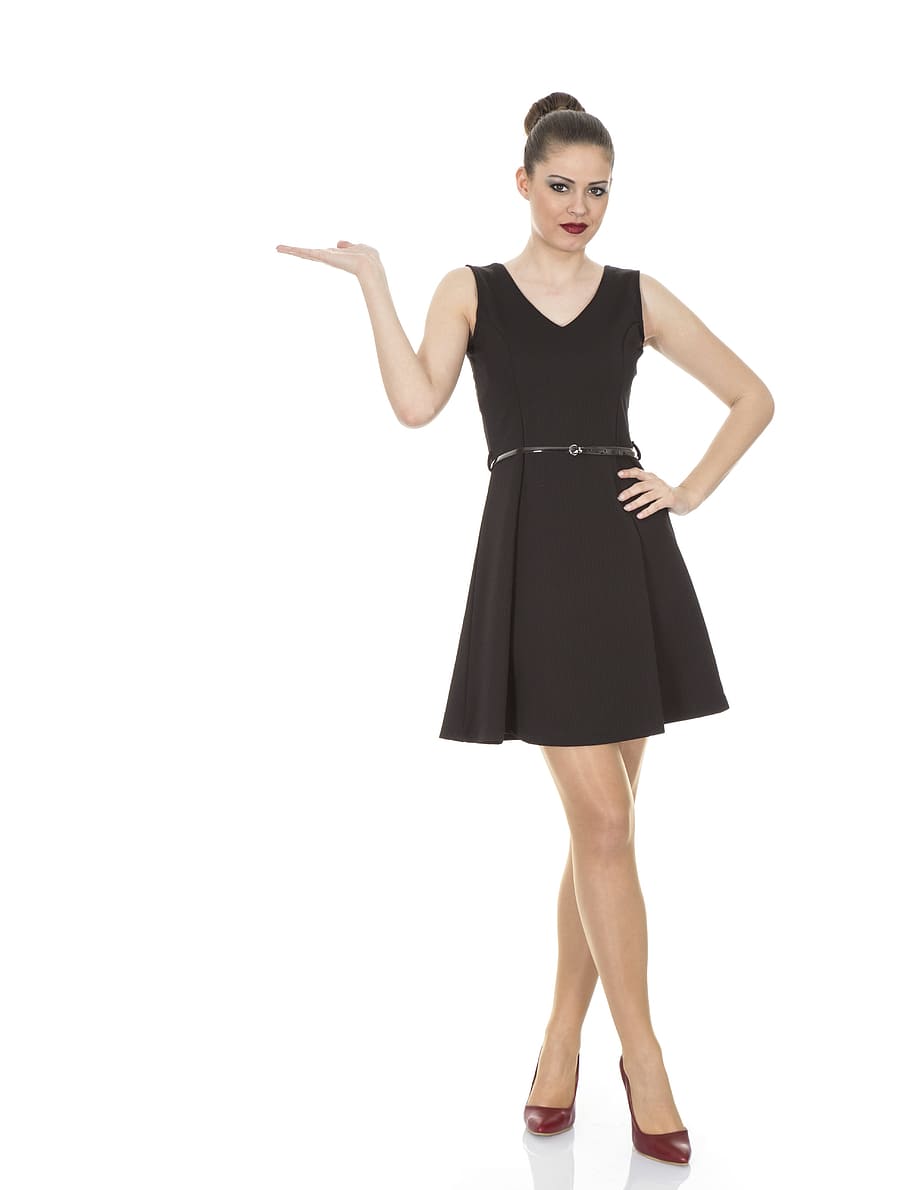 woman, wearing, black, v-neck sleeveless mini dress, model, el, young model, face, finger, portrait