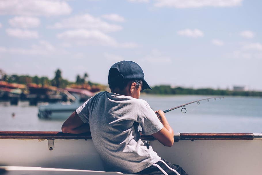 boy, holding, fishing rod, people, kid, child, fishing, boat, sailing, sky