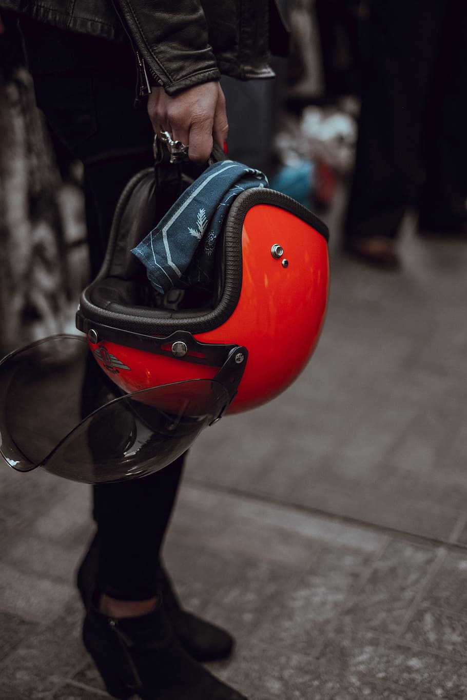 people, woman, helmet, head, gear, travel, ride, human body part, low section, focus on foreground