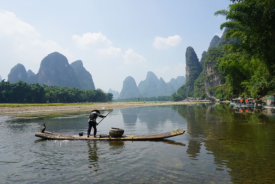 xingping, bamboo raft, fishman, water, nautical vessel, transportation, mode of transportation, beauty in nature, sky, mountain