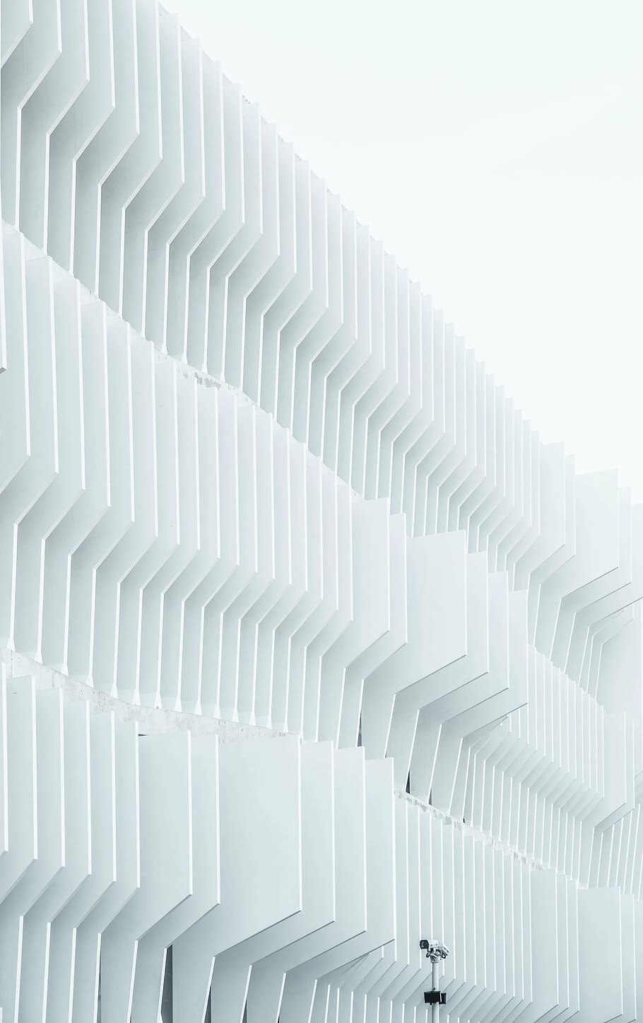white building facade, architecture, building, structure, design, art, blue, sky, in a row, white color