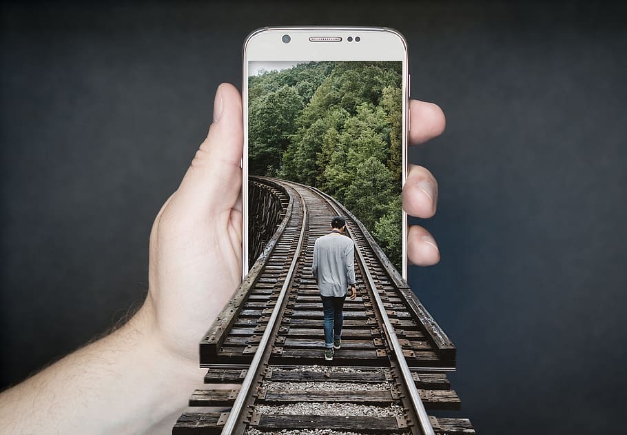 man, walking, train rail, person, holding, white, optical, illusion artwork, Manipulation, Smartphone