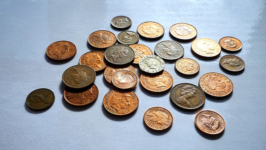 round copper-colored, silver-colored coin lot, money, coin, finance, currency, cash, fund, credit, budget
