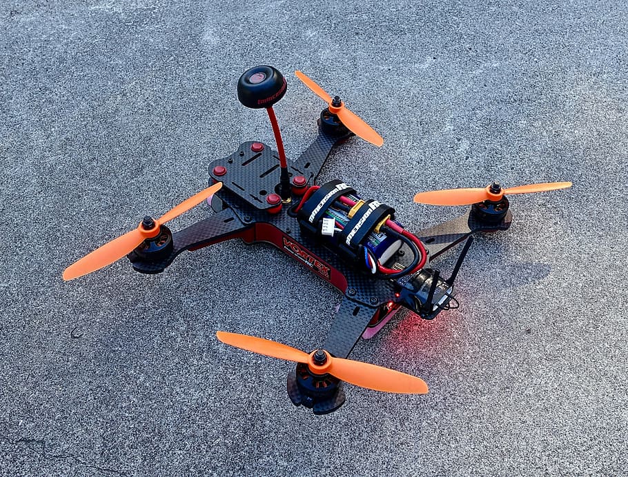 orange, black, radio-controlled, drone, gray, concrete, quadcopter, aircraft, aerial, control