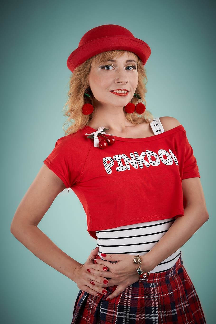 plaid skirt, baby doll, provocatively, playfully, coquette, flirting, hat, lady in red, studio, studio portrait