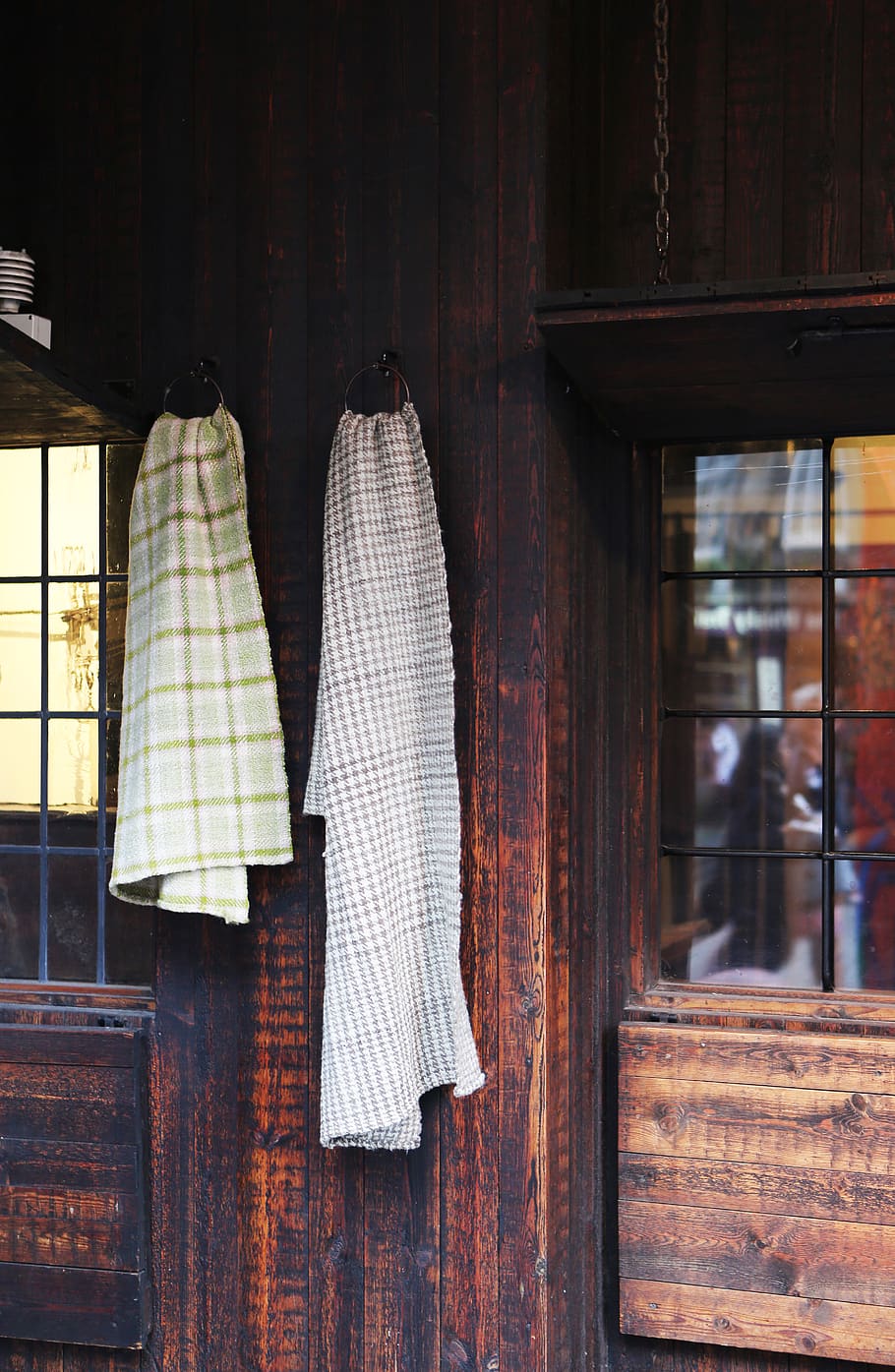 towels, wood, house, window, hanging, wood - material, day, indoors, built structure, architecture