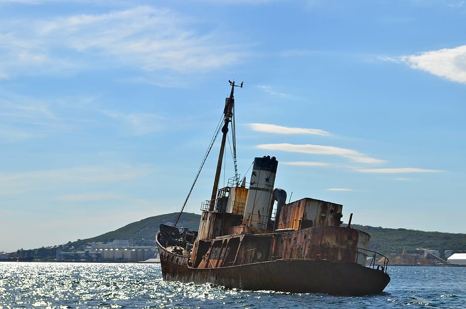 brown, cargo ship, sea, boat, ship, rust, shipwreck, pirate, asylum seeker, whaler