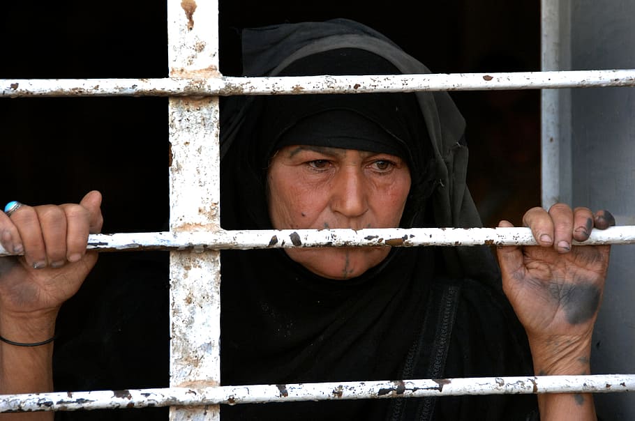 woman, white, grill gate, iraq, house, home, looking, female, viewing out, portrait