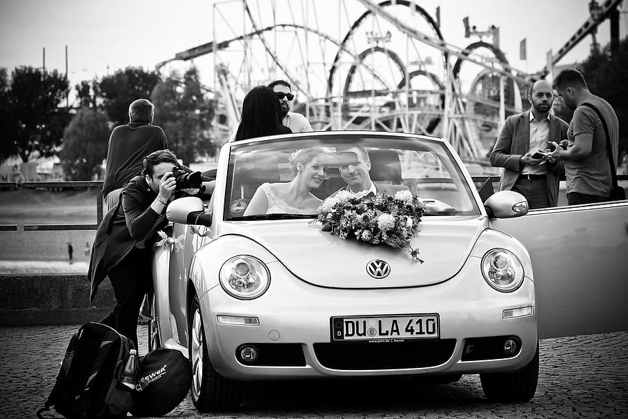 grayscale photography, brides, groom, riding, volkswagen beetle, convertible, coupe, wedding, wedding photographer, lovers