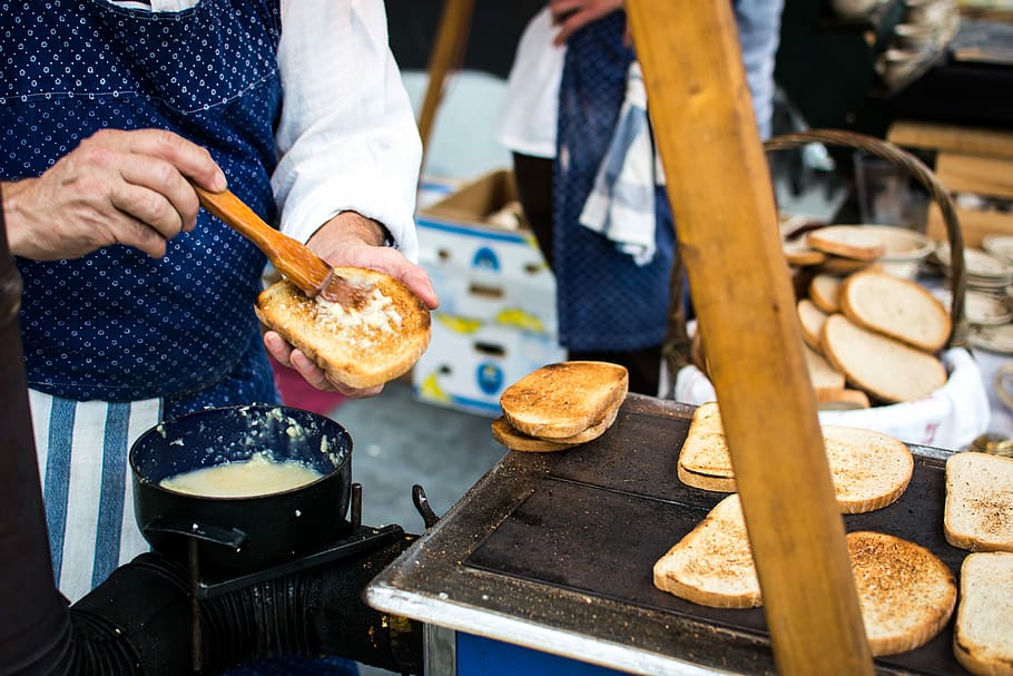 toasted, bread, garlic, Traditional, Czech, toasted bread, hands, market, outside, street food