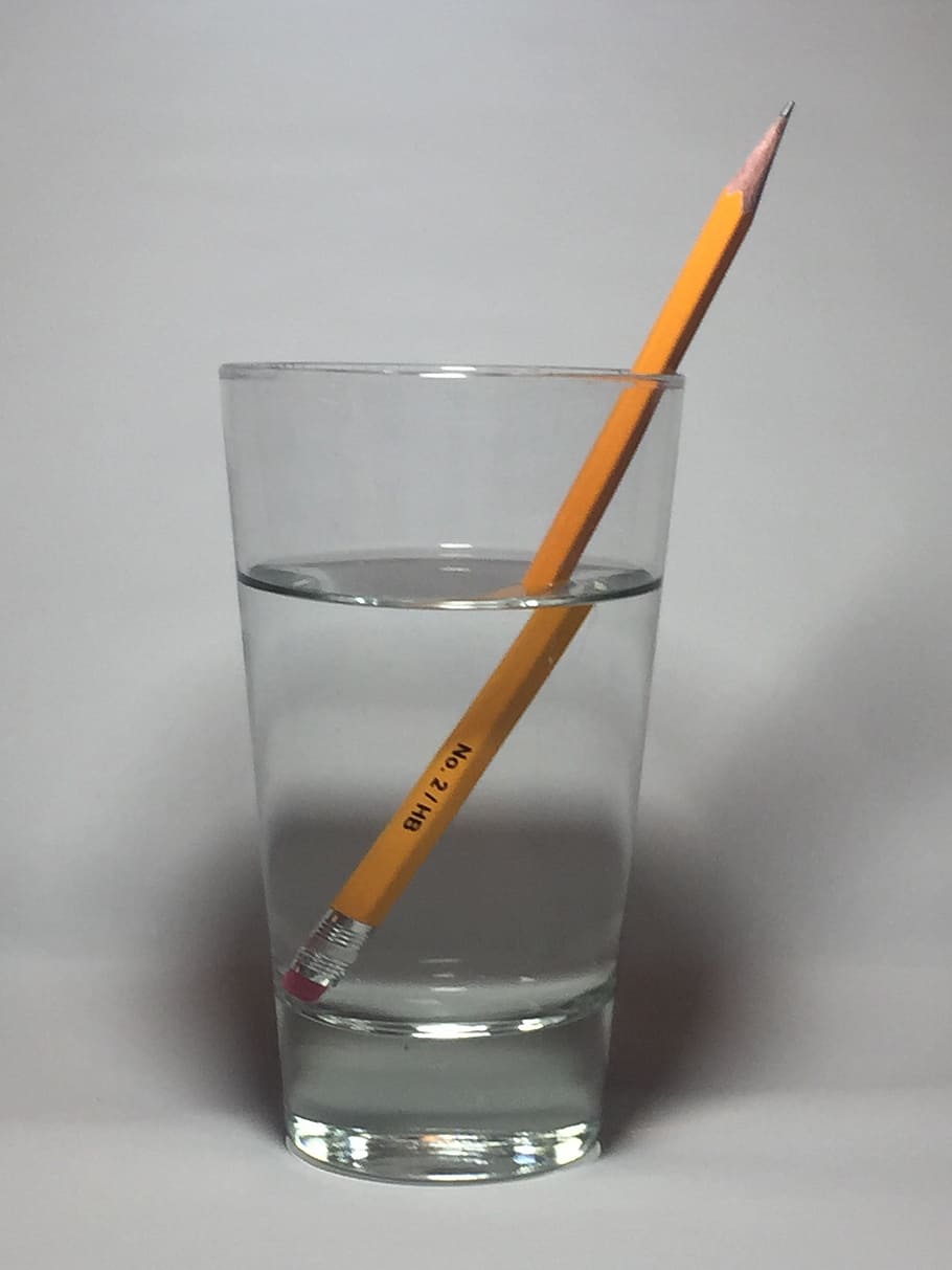 pencil, bent pencil, pencil in water, refract, refraction, optical illusion, water, angle of refraction, index of refraction, physics