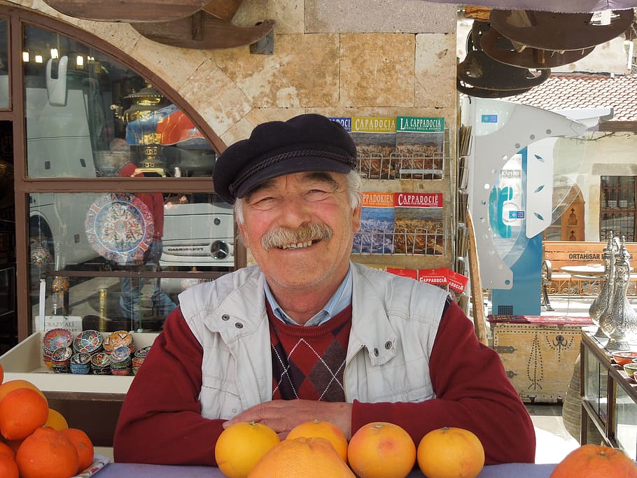 man, standing, front, orange, fruit, turkey, seller, oranges, stall, market
