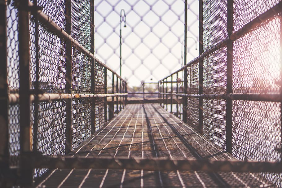 fence, cage, bridge, lamp posts, metal, architecture, security, built structure, boundary, barrier