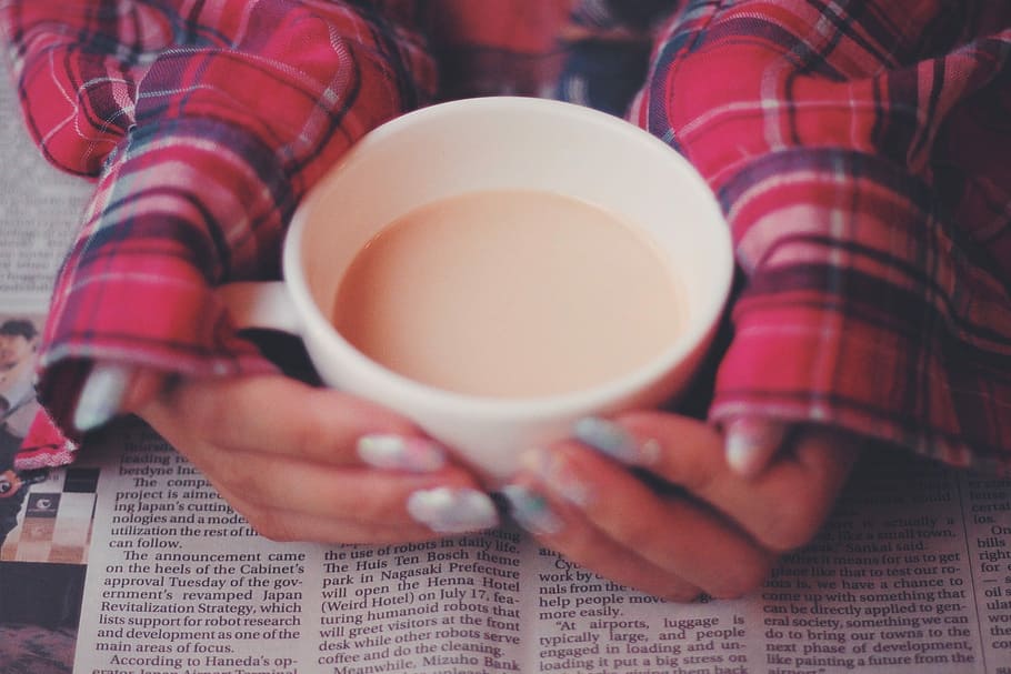 person, red, tops, touching, filled, white, ceramic, mug, top, newspaper