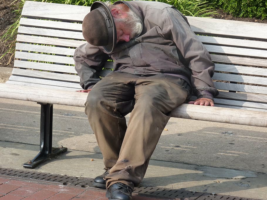 man, gray, dress shirt, pants, sleeping, wooden, bench, daytime, homeless man, old