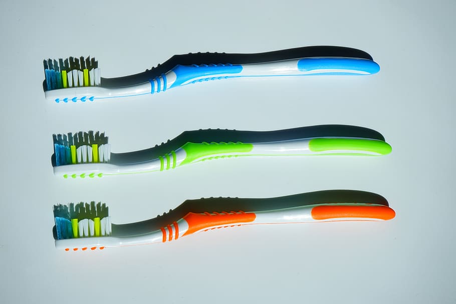 three assorted-color toothbrushes, tooth brushes, hygiene, clean, dental care, dental hygiene, toothbrush head, bless you, brush head, care