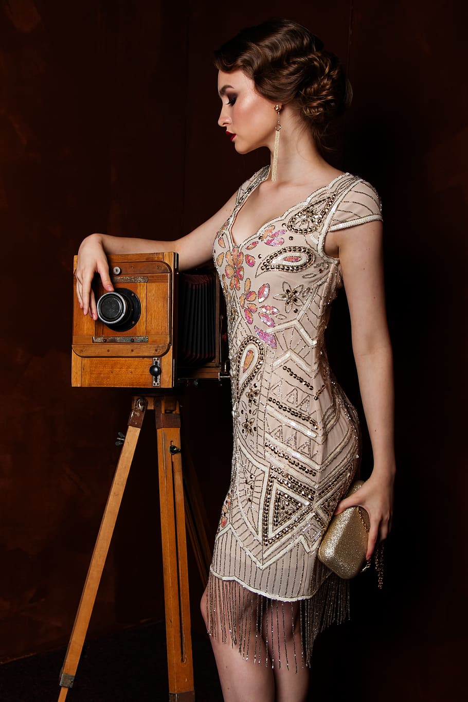 woman, gray, brown, paisley scoop-neck dress, standing, camera, one, people, grown up, portrait