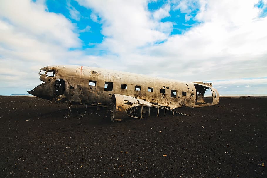 gray plane frame, iceland, airplane, crash site, broken, accident, damage, wreckage, landmark, remains