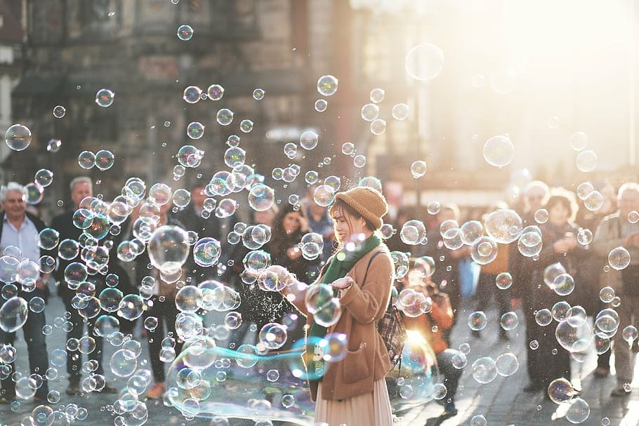 woman, surrounded, bubbles, playing, day, time, people, crowd, girl, men
