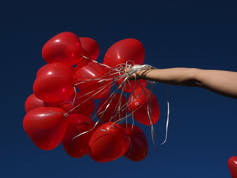 person, holding, red, balloons, daytime, detention, arm, hand, rise, upgrade