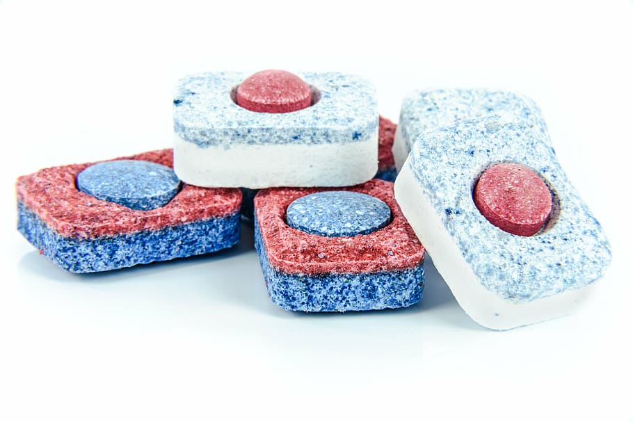 six, red-blue-and-white ornaments, white, surface, dishwasher, tablets, machine, isolated, the background, laundry detergent