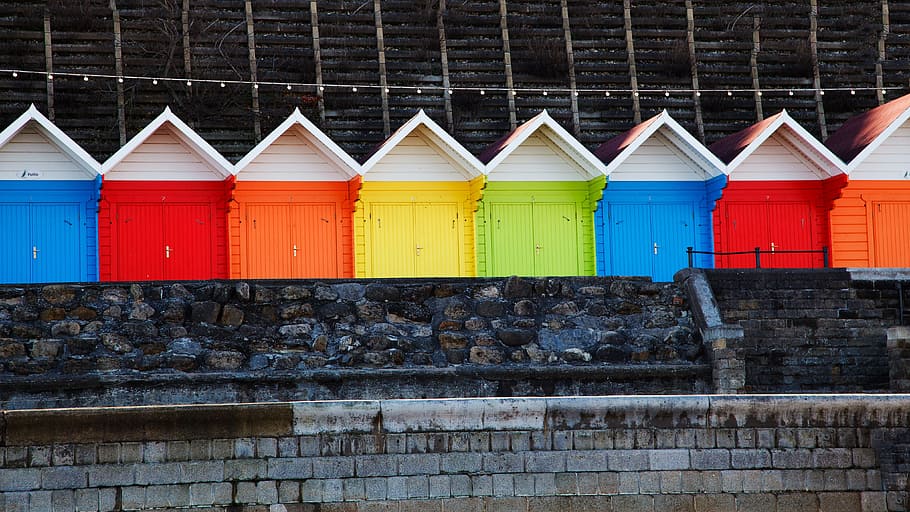 assorted-color wooden doors, architecture, beach, bright, cabin, coast, color, colored, colorful, colour