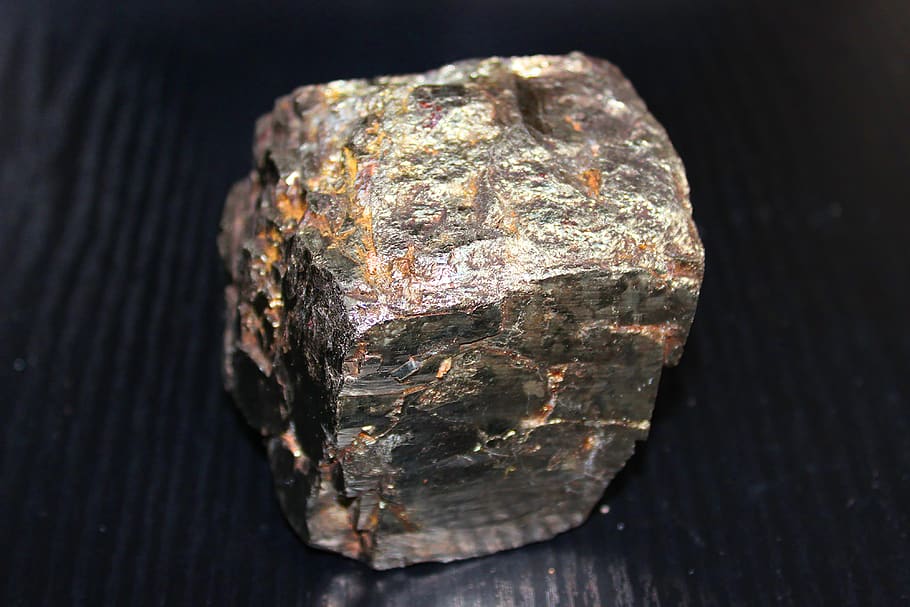 meteorite, part piece, metal, stone, metallic, structure, close-up, indoors, still life, wood - material