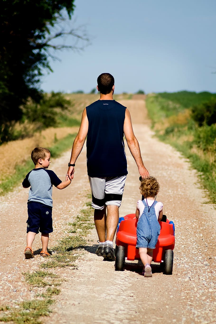 man, walking, two, children, brown, road, family, dad, father, son