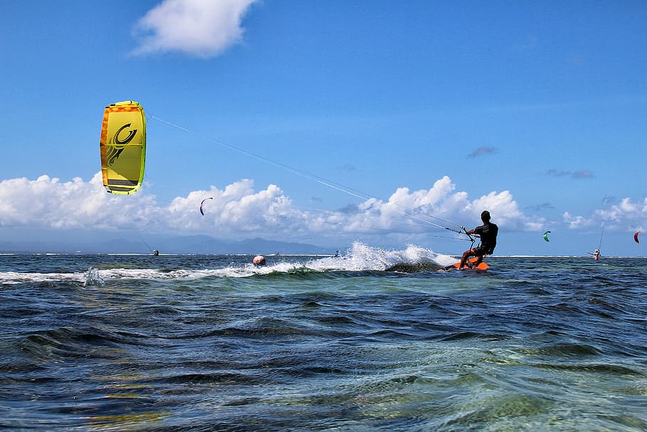 person kitesurfing, daytime, kite surfing, bali, sanur, aquatics, action, wind, waves, surfer