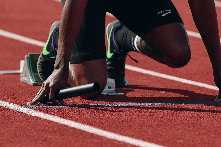 person, wearing, black-and-green nike, running, shoes, kneeling, starting, line, athlete, color