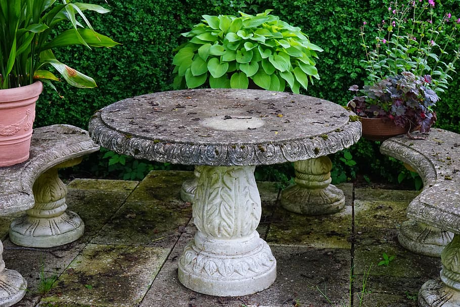 round, grey, concrete, pedestal table, benches, plants, table, stone table, seating area, idyllic